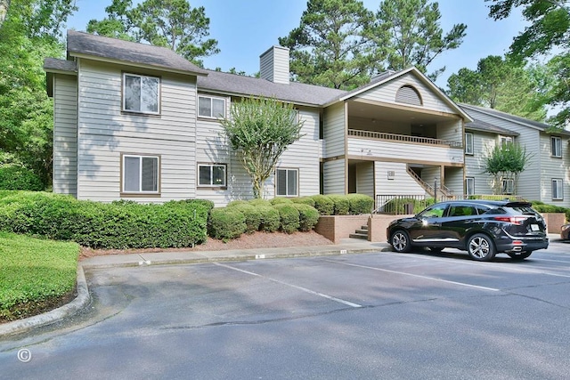 6400 Green Island Dr Unit 9, Columbus, GA 31904 - view of building exterior featuring uncovered parking