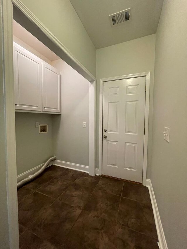 unfurnished bedroom featuring baseboards, visible vents, and carpet floors