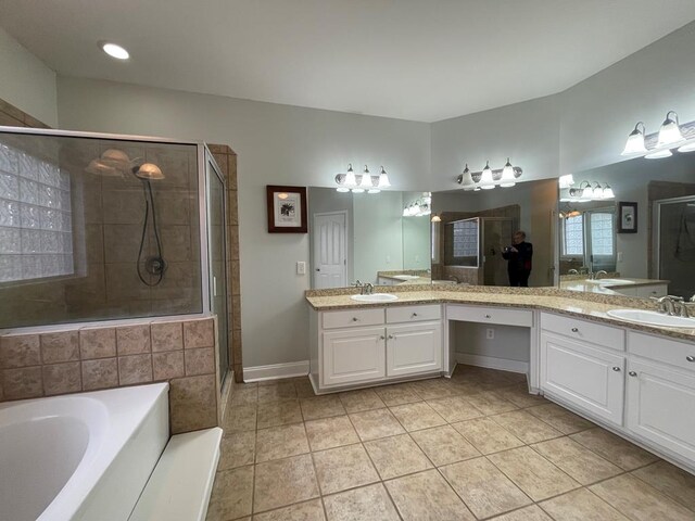 unfurnished room featuring baseboards, a ceiling fan, and a wall unit AC