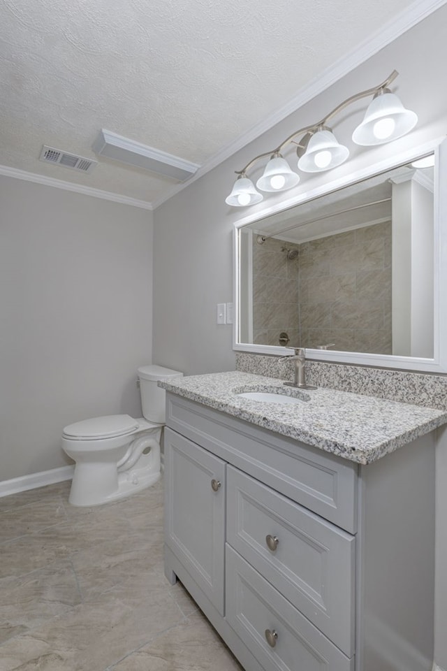 bathroom with a textured ceiling, toilet, visible vents, vanity, and ornamental molding