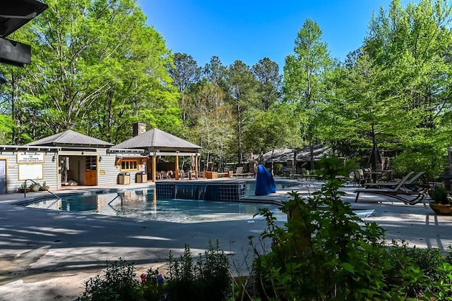 community pool featuring a patio area