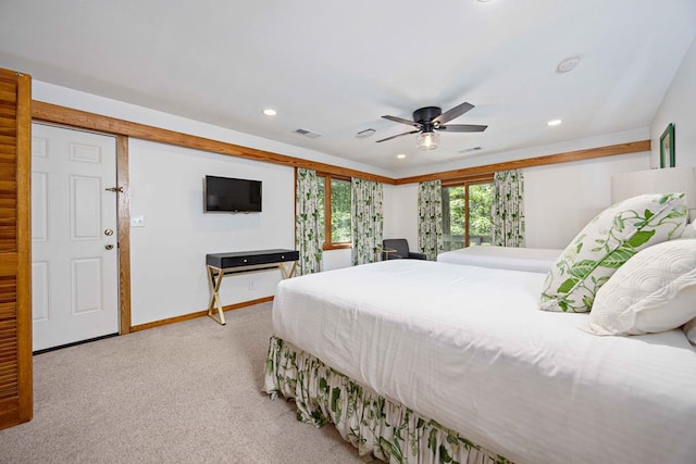 carpeted bedroom with baseboards, visible vents, and recessed lighting