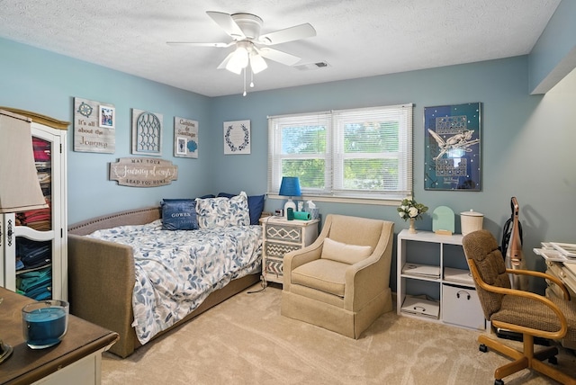 8500 Jackson Rd, Midland, GA 31820 - bedroom with carpet floors, a desk, a textured ceiling, and ceiling fan