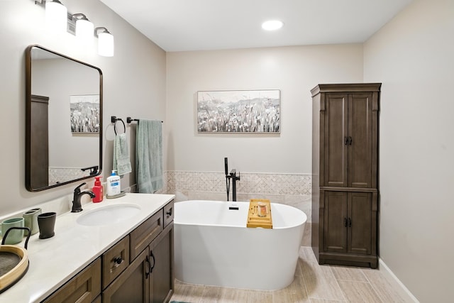 8500 Jackson Rd, Midland, GA 31820 - bathroom with a soaking tub, vanity, and recessed lighting