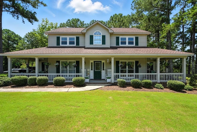 8500 Jackson Rd, Midland, GA 31820 - view of front of home with a porch, a front lawn, and roof with shingles