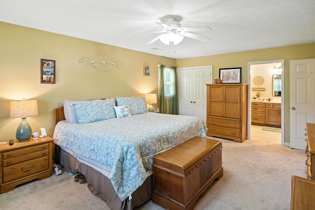 8500 Jackson Rd, Midland, GA 31820 - bedroom with light carpet, a closet, ensuite bath, and ceiling fan