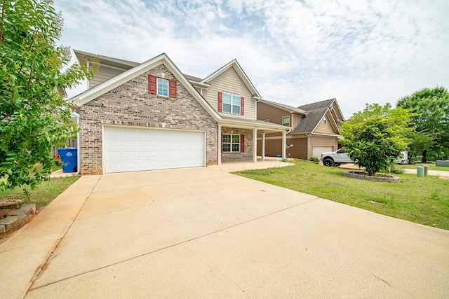 7312 Sorrel Ct, Columbus, GA 31909 - traditional-style house with brick siding, driveway, a front lawn, and a porch