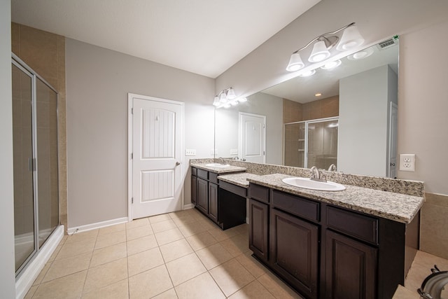 7312 Sorrel Ct, Columbus, GA 31909 - bathroom with a stall shower, tile patterned floors, and double vanity