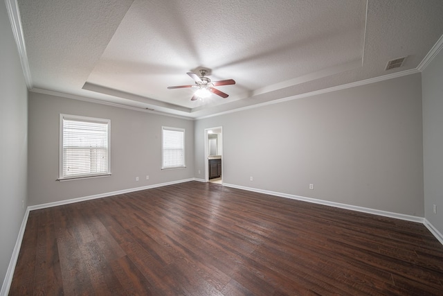 7312 Sorrel Ct, Columbus, GA 31909 - empty room featuring a tray ceiling, a ceiling fan, dark wood-style flooring, a textured ceiling, and baseboards