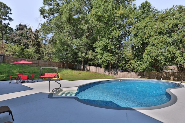 6727 Trapper Way, Midland, GA 31820 - view of pool featuring a patio, a fenced backyard, and view of wooded area