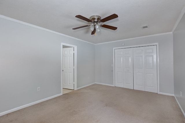 6727 Trapper Way, Midland, GA 31820 - unfurnished bedroom featuring light colored carpet, ornamental molding, a closet, and ceiling fan