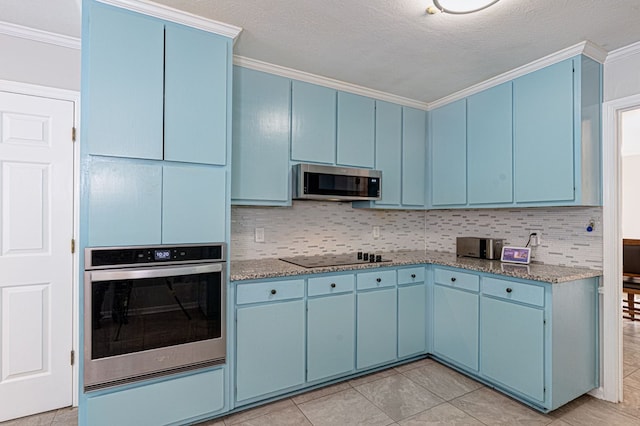 6727 Trapper Way, Midland, GA 31820 - kitchen featuring stainless steel appliances, blue cabinetry, and crown molding
