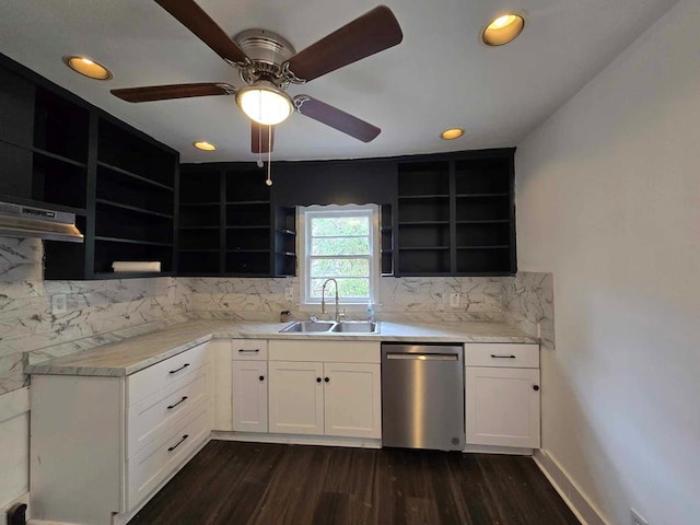 kitchen with dishwasher, dark hardwood / wood-style floors, white cabinetry, and sink