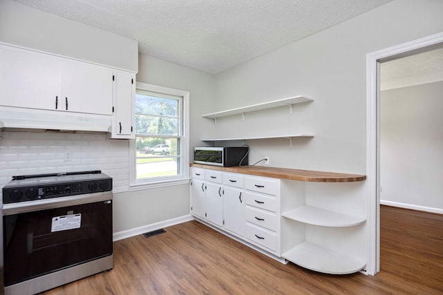 3824 Forrest Rd, Columbus, GA 31907 - kitchen featuring electric range oven, open shelves, under cabinet range hood, wood finished floors, and white cabinets