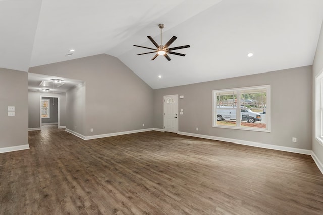 unfurnished living room with dark hardwood / wood-style floors, ceiling fan, and high vaulted ceiling