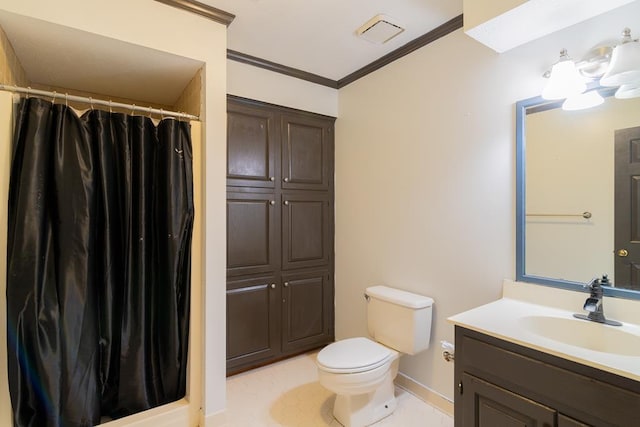 bathroom with vanity, tile patterned floors, crown molding, a shower with shower curtain, and toilet