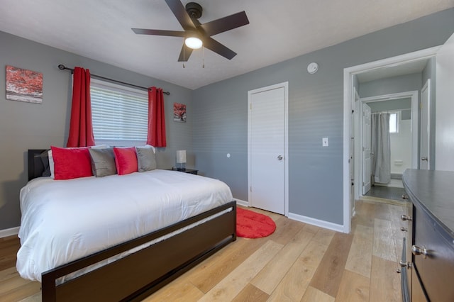 bedroom featuring light hardwood / wood-style flooring and ceiling fan