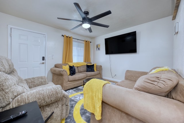 living room with ceiling fan