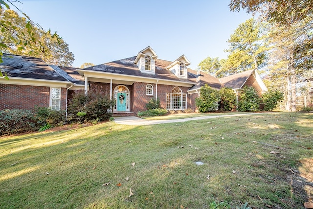 view of front of home with a front yard