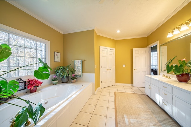 bathroom with tile patterned flooring, vanity, ornamental molding, and tiled tub