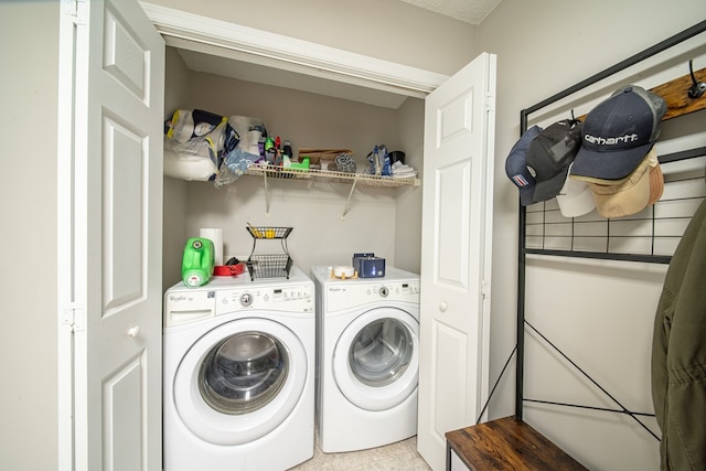 laundry room featuring independent washer and dryer