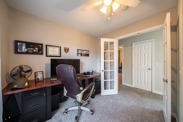 office with dark colored carpet, french doors, a textured ceiling, and ceiling fan