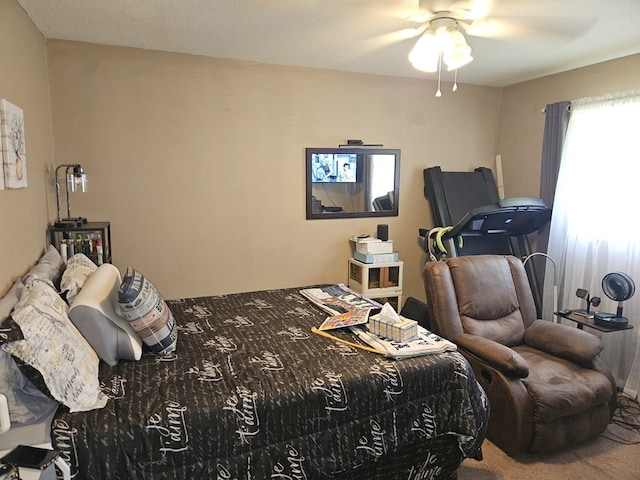 carpeted bedroom with a ceiling fan