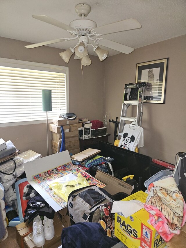 office area with a ceiling fan