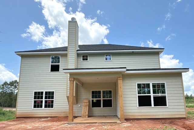 rear view of house with a patio