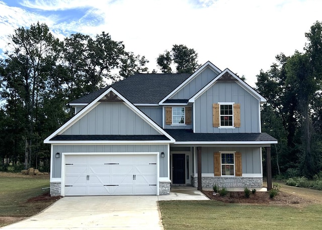 craftsman inspired home with covered porch and a front yard