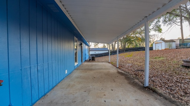 view of patio with a shed