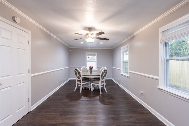 dining space featuring crown molding, dark hardwood / wood-style floors, and ceiling fan