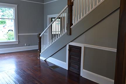 staircase featuring wood-type flooring