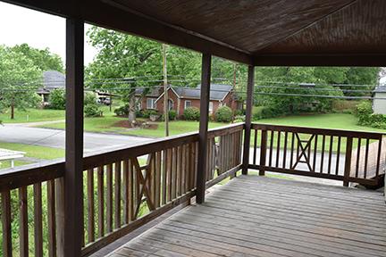 wooden deck with a porch