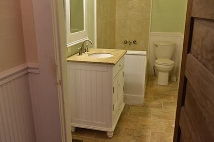 bathroom with vanity and toilet