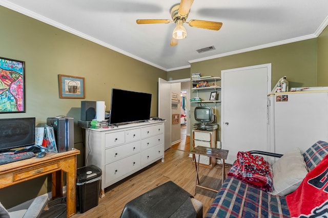 interior space featuring light wood-type flooring and ornamental molding