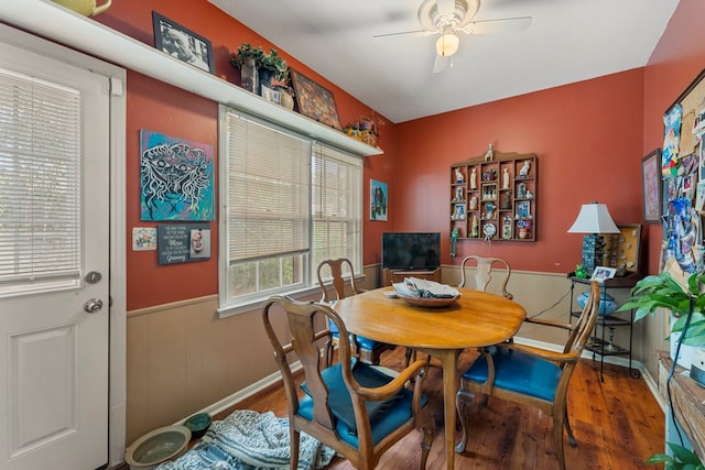 dining room featuring ceiling fan and wood-type flooring