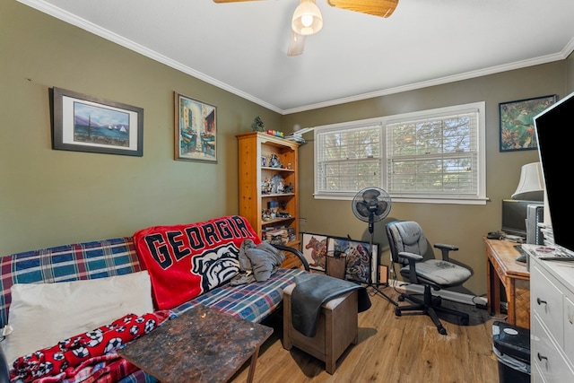 office with ceiling fan, crown molding, and light wood-type flooring