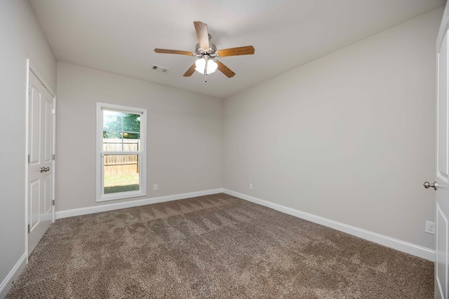 empty room with carpet floors