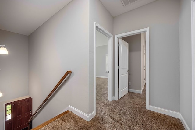 hallway with carpet