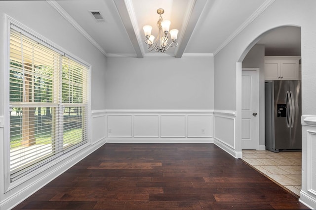 unfurnished dining area with a wealth of natural light, dark hardwood / wood-style flooring, and ornamental molding