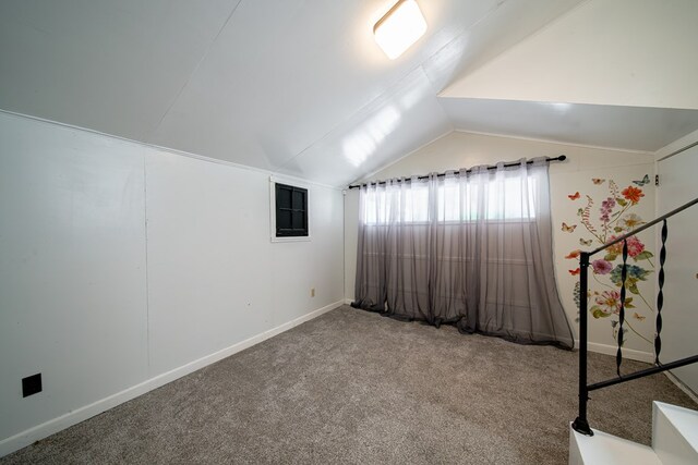 1729 41st St, Columbus, GA 31904 - bonus room featuring lofted ceiling, carpet flooring, and baseboards