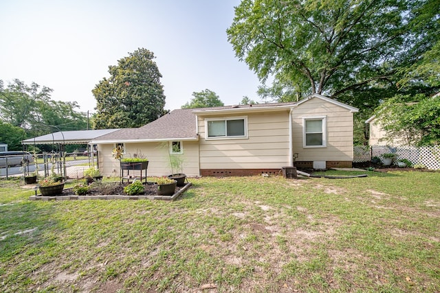 1729 41st St, Columbus, GA 31904 - back of house featuring crawl space and a gate