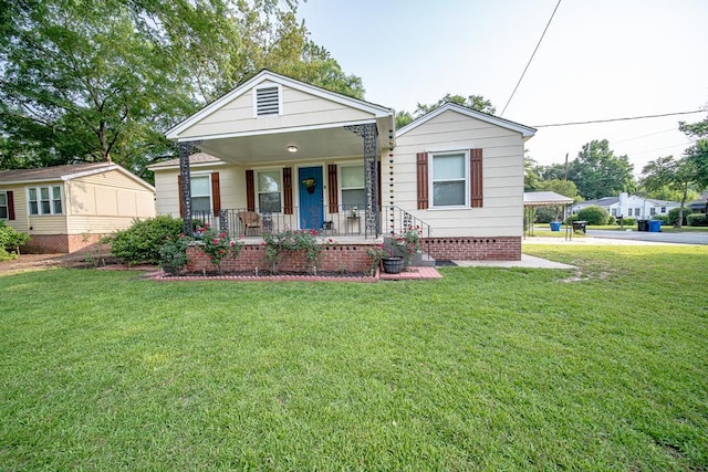 1729 41st St, Columbus, GA 31904 - view of front of property with a porch and a front yard