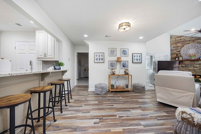 333 Eastside Dr Unit 4, Fortson, GA 31808 - living area featuring light wood-type flooring, baseboards, visible vents, and recessed lighting