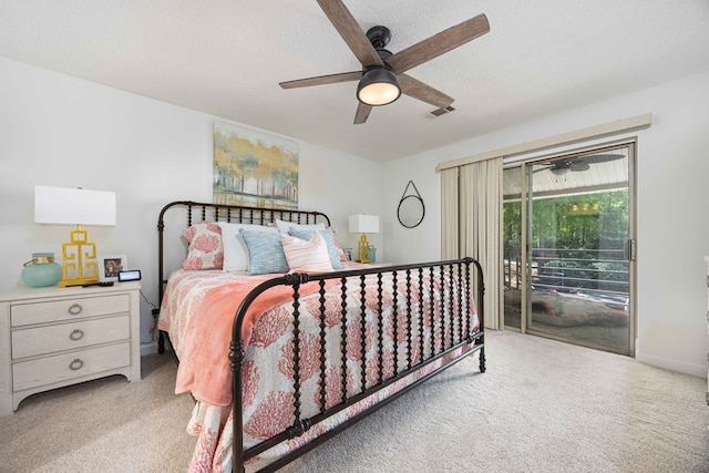 333 Eastside Dr Unit 4, Fortson, GA 31808 - carpeted bedroom with access to outside, a ceiling fan, visible vents, and a textured ceiling