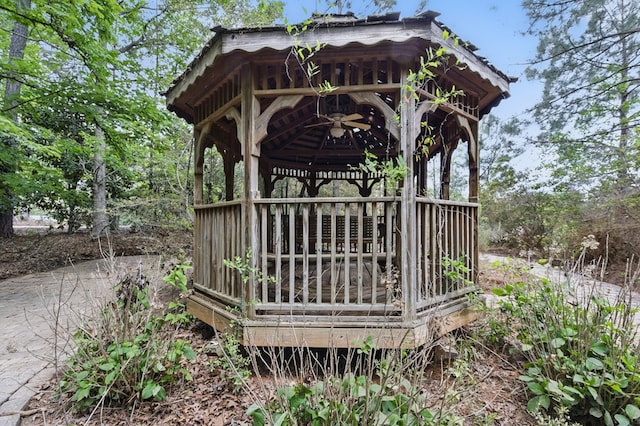 exterior space featuring a gazebo and ceiling fan