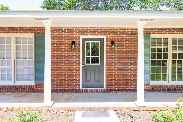 8085 Ga Highway 0219, Hamilton, GA 31811 - entrance to property featuring covered porch and brick siding