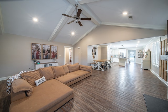 living room featuring ornamental molding, vaulted ceiling with beams, hardwood / wood-style floors, and ceiling fan