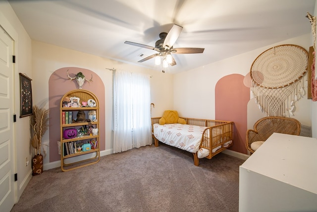 carpeted bedroom featuring ceiling fan